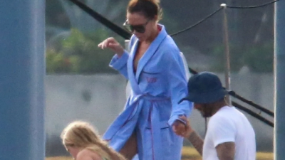 Victoria Beckham wears monogrammed 'VB' dressing gown on £5m mega-yacht in Miami 
