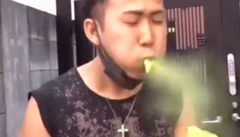 People trying to eat matcha soft-serve from Nakamine Seicha in Tokyo