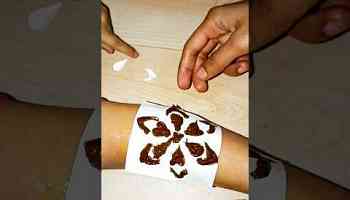 how to apply mehndi paper stencil #paper flowers #bodyart #stencil #papercraft #tattoo #shorts #art
