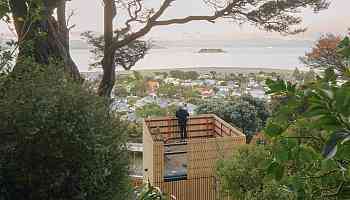 Tiny timber tower airlifted into New Zealand landscape