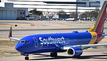 An engine cover rips off a Southwest Airlines Boeing 737, forcing an emergency landing