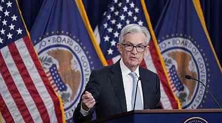 Fed Cites Lack of Progress on Inflation, Holds Rates Steady