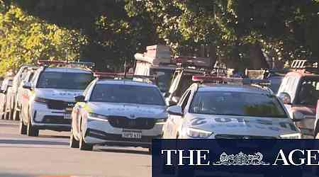 Officers attend school of student shot dead by police
