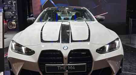 2025 BMW M4 Alpine White Filmed Featuring Black Body Decals