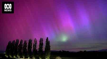 What are geomagnetic storms and why do they produce the aurora australis and borealis?
