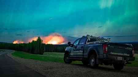 Conditions improve for crews battling growing wildfire near Fort Nelson, B.C.