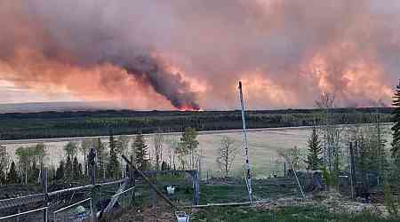 Crews fighting wildfires near Fort Nelson, B.C, hope skies open up again after rainy Thursday