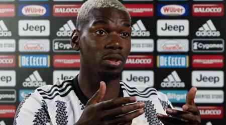 Suspended Juventus midfielder Pogba reacts to Allegri sacking