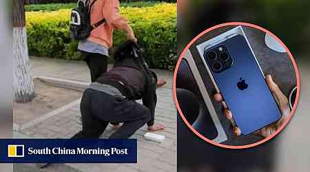 China father kneels on street after daughter shamed him for having no money to buy her a phone, sparking heated debate