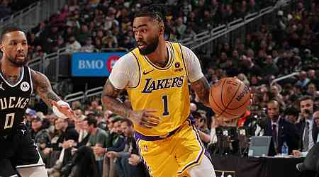 Russell says he intends to opt in, stay with Lakers