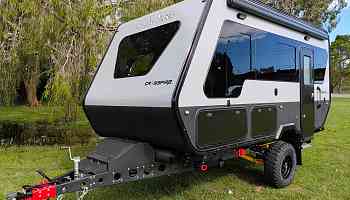 Crossfire 4.7 trailer with dual kitchen and array of windows is crafted for rugged exploration