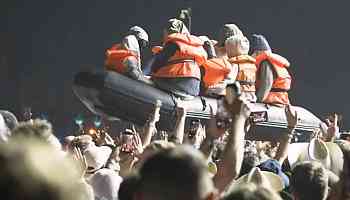 Banksy Floats Raft at Glastonbury to Warn of Worsening Migrant Crisis