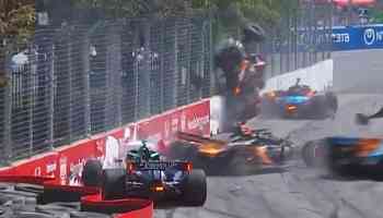 IndyCar driver launched into fence in huge multi-car crash as Toronto race red-flagged to clear debris-filled street