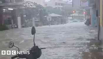 Watch: People rescued as Typhoon floods shops and streets