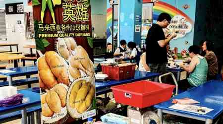 Staff at Serangoon primary school snap up 400kg of durians in 2 hours