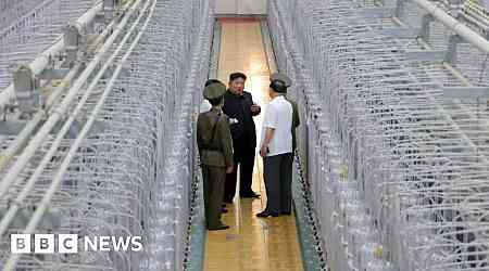 N Korea releases rare photos of Kim at uranium facility