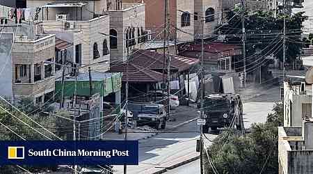 Footage shows Israeli soldier pushing body off roof in West Bank raid