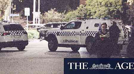 Police locked in tense stand-off with man in Melbourne