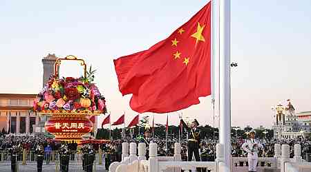 Beijing celebrates PRC's founding, travel rush begins