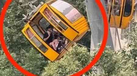 Cable car door opens, woman falls out