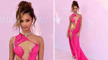 Singer stuns in racy red carpet look