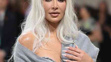  Kim Kardashian Is Unrecognizable in Albino Alligator Halloween Costume 