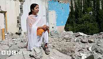 Melting glaciers leave homes teetering in valley of jagged mountains