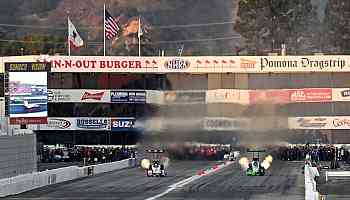 Plane crashes into parking lot near track during NHRA season finale at Pomona Dragstrip