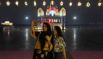 Thousands of Indian Sikhs visit the shrine of the founder of their religion to mark his birthday