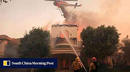 Wildfire near Los Angeles burns dozens of homes, thousands of people told to flee