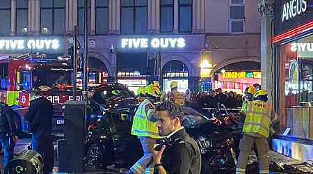 Three rushed to hospital after car smashes into Piccadilly Circus Angus Steakhouse as diners are inside