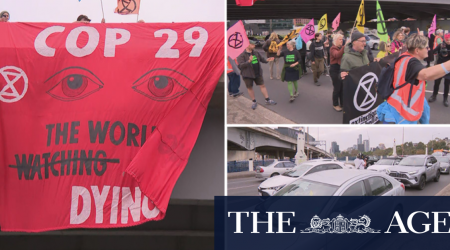 Extinction Rebellion climate activists block traffic on busy Melbourne road