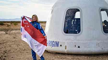 She's not a Singapore citizen yet, but she proudly took national flag to outer space