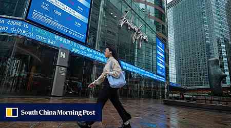 Hong Kong stock market operates as normal during first-ever typhoon trading session