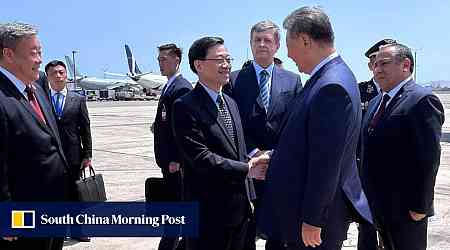 Hong Kong leader John Lee greets Chinese President Xi Jinping in Peru ahead of Apec summit