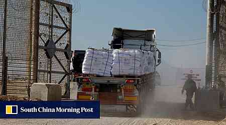 Nearly 100 food aid trucks violently looted in Gaza, UN agencies say