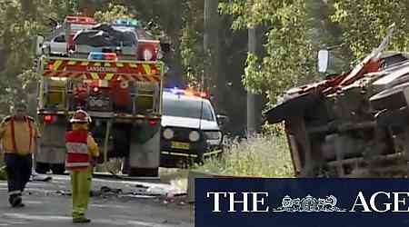 Six firefighters in hospital after their truck rolled