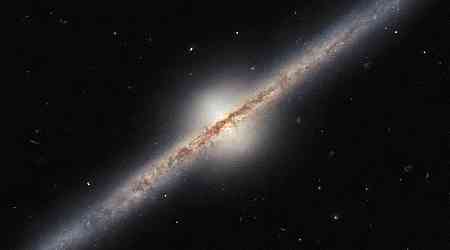 Hubble Space Telescope Captures Rare Edge-On View of a Spiral Galaxy Located Millions of Light-Years Away