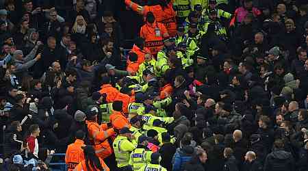 Man City and Feyenoord fans clash in chaotic Champions League tie as objects thrown