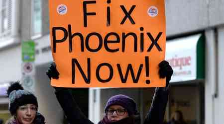 Government settles in Phoenix pay system class-action suit