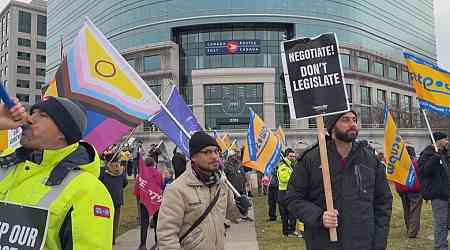 Striking Canada Post workers rally at head office in Ottawa