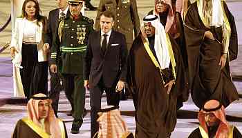 Macron begins state visit to Saudi Arabia as political crisis looms in France