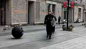 China unveils all-terrain robocops...