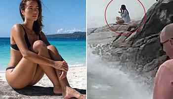 Tourist swept away by wave while doing yoga...