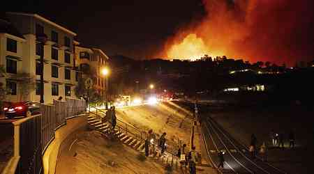 Wildfire explodes in Malibu...