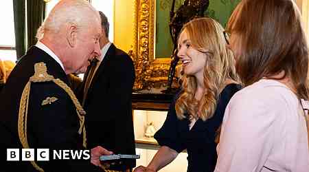 King presents Elizabeth Emblems to families of those who died on duty