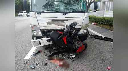 Motorcyclist trapped under lorry for 30 minutes following chain collision on PIE