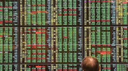 Taiwan shares open lower