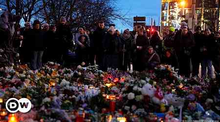 Magdeburg: Mourners gather for Christmas market vigil