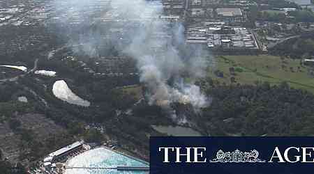 Fire crews tackle bushfire near Sydney Olympic Park